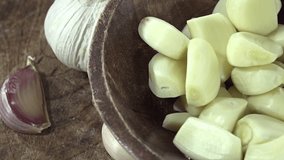 Peeled Garlic (seamless loopable) as detailed 4K UHD footage