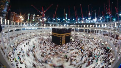 Time-lapse of pilgrims circumambulate the Kaaba in the evening in 4K. DCI 4K, 4096 x 2160p (Cinematic cinemascope display)