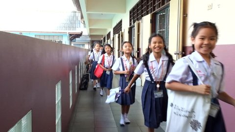 BANGKOK, THAILAND -  FEB 9, 2015: Unknown children in lesson on the classroom at  Elementary School. Pieamsuwan school in bangkok at 2015, Students walking to class room.