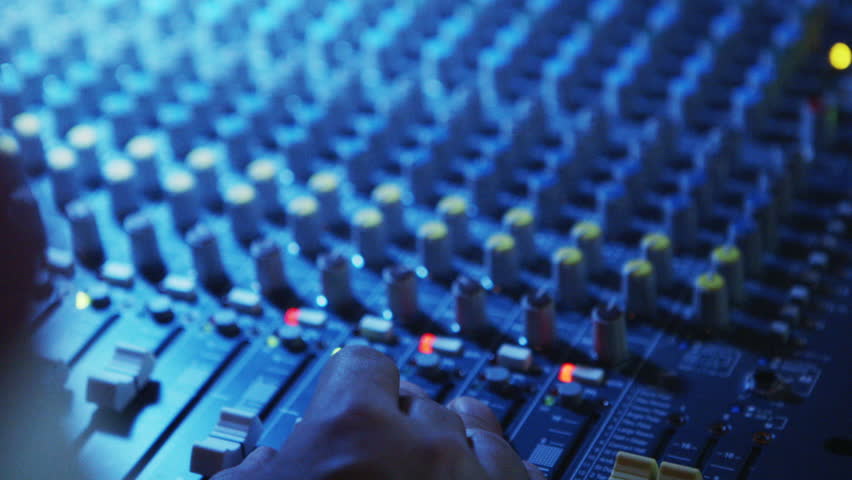 Close up of man's hand working a sound board | Shutterstock HD Video #9118823