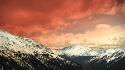 Early Early Winter Mountains Snow Sunset Clouds Skiing. Great for themes of skiing, winter sports, adventure, mountains, nature, weather, tourism, travel. Excellent loop for nature composites. Stock Video