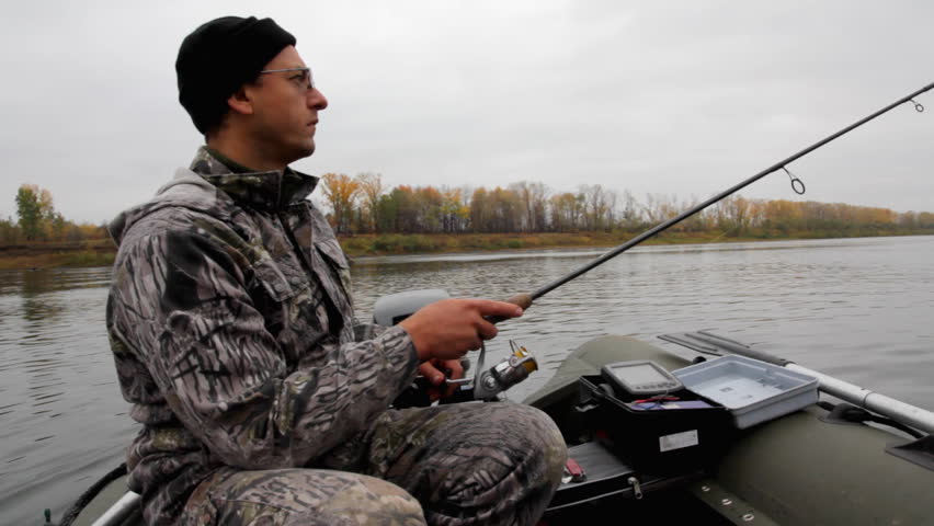 man wearing camouflage outfit  fishing  