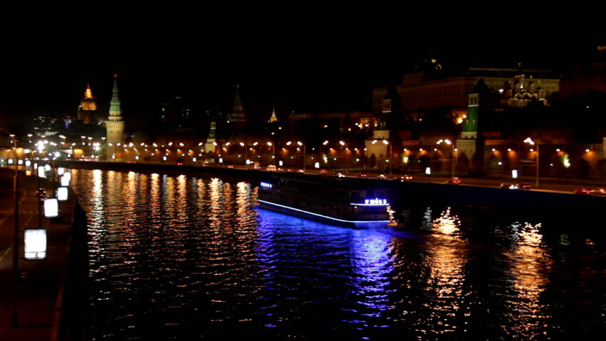 Moscow Kremlin river night landscape with ship 