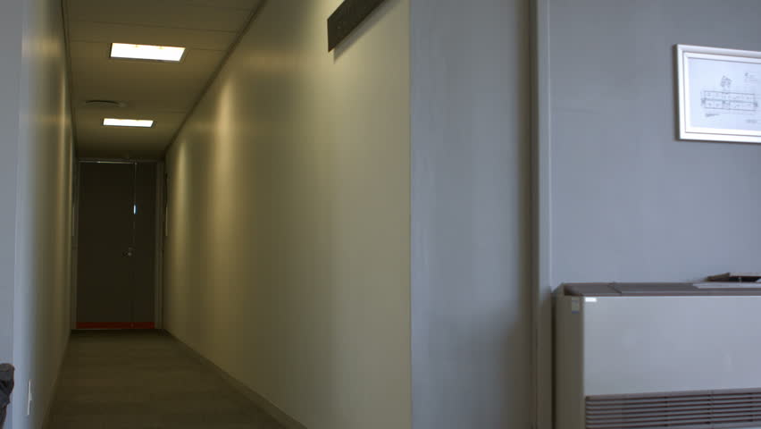 Side view of diverse students getting out of their classroom at school