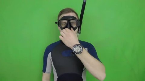 Diving sign- divemaster  shows sing  EQUALIZE PRESSURE  ,also a available on the green screen all of diving sings from course (open water diver)

