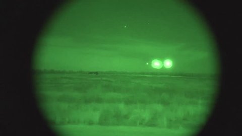 CIRCA 2010s - Night vision footage of U.S. Air Force C-17 landing.