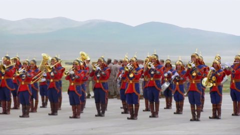 CIRCA 2010s - Mongolian and U.S. army troops march in formation during an official ceremony.