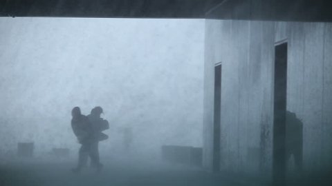 people struggling inside a building during gale force extreme weather rain storm blizzard, Reykjavik, Iceland