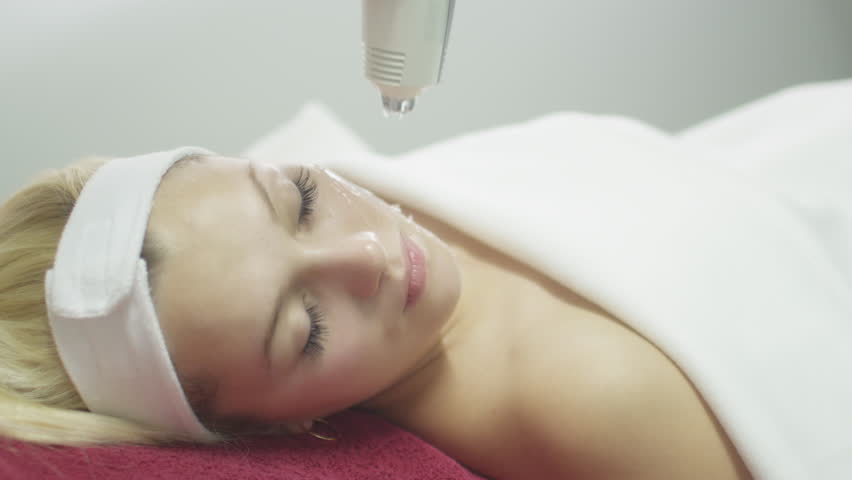 Pretty Girl on Laser Skin Treatment Procedure. Shot on RED Cinema Camera in 4K (UHD). Its easy scale, rotate and crop without loosing quality.
