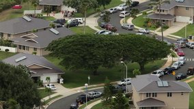 CIRCA 2010s - High angle view over a neighborhood having a block party. - Powered by Shutterstock - Get 15% off with code: PIKWIZARD15