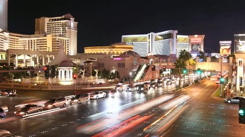 Time lapse Las Vegas Strip at night. All trademarks are blurred. License plates cannot be identified.