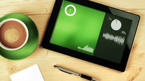 Various Animated Infographics Charts on Digital Tablet Computer Placed on Office Desk as Technology, Science, Data Analysis, Business, Finance or Economy illustrative background. 1920x1080 full hd. - Powered by Shutterstock - Get 15% off with code: PIKWIZARD15