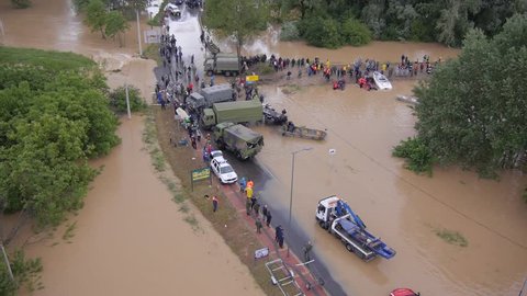 Obrenovac, Serbia May 2014. Army and police rescue teams saving people from heavy floods.

