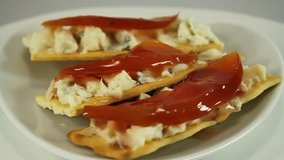 Snack on crackers with gorgonzola blue cheese and quince jam  - Powered by Shutterstock - Get 15% off with code: PIKWIZARD15