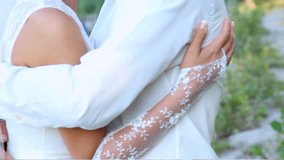 wedding couple embracing on wedding day. bride and groom. bride in white wedding dress holding wedding bouquet. just married couple in love. full hdv video. definition high 1920x1080. hidef