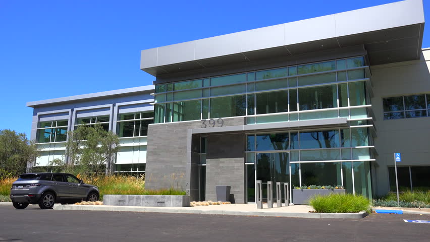 CALIFORNIA - CIRCA 2014 - Establishing panning shot of the exterior of a generic modern office building. | Shutterstock HD Video #9227864