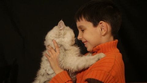 boy and white cat
