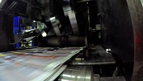 4K production lines crossing in newspaper printing press. UHD stck video LOOP