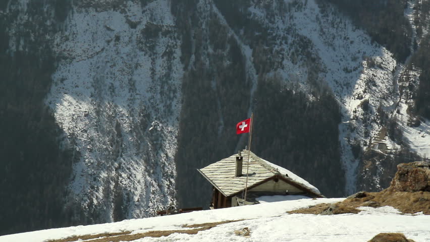 Early Spring in the Alps. Chalet near Saint-Martin village, Valais , Switzerland.