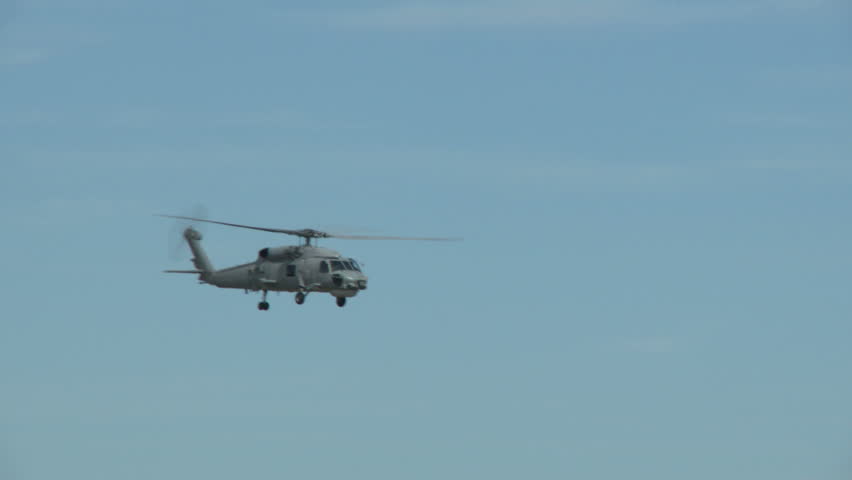 A seawhak helicopter performing a climbing turn