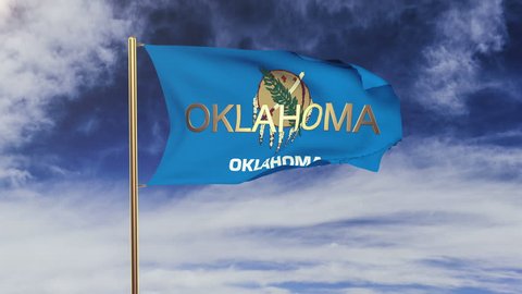 oklahoma flag with title waving in the wind. Looping sun rises style.  Animation loop