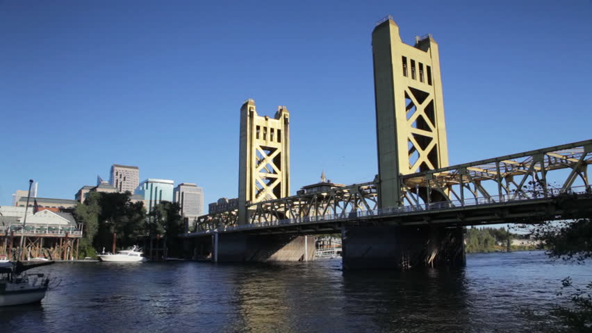 The landmark Tower Bridge in Sacramento, California, and the Sacramento River, shortly before sunset.