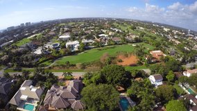 Aerial video of Boca Raton golf courses and residential neighborhoods 4k