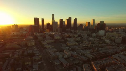 Los Angeles Aerial Downtown Cityscape Sunrise v85 Low flying aerial downtown with cityscape view.