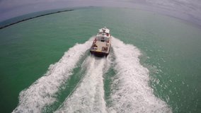 Chasing a boat 4k aerial video