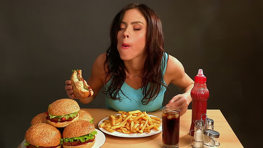 Woman Eating Fast Food.slim Girl Stock Footage Video (100% Royalty-free)  9299963 | Shutterstock