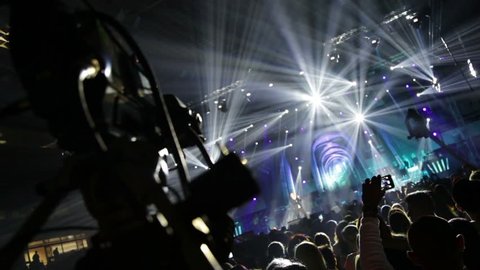 Television production on the set of a large rock concert