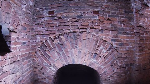 Corridor in the fort, brick walls and arches.
