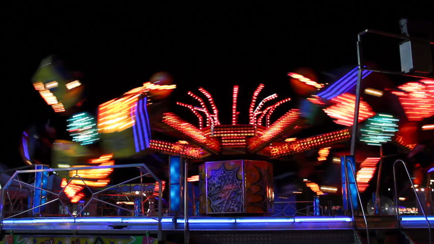 Spinning carousel at night