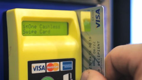 LOS ANGELES, CA - MARCH 24: Using Visa credit card for payment on March 24, 2015. Visa Inc. is an American multinational financial services corporation headquartered in California, United States.