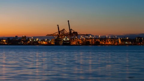Time Lapse Movie of Heavy Shipyard Machinery Moving Cargo Containers in Port of Vancouver BC Canada at Sunrise 1920x1080