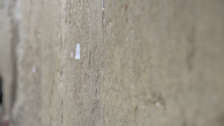 JERUSALEM, ISRAEL - MARCH 19,  Jewish Man Pray and Man kissing a stones of the Western Wall.  Jerusalem. Israel