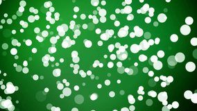 4k Dancing green and white blobs and orbs, stylish eye catching Modern Fairy dust style 30 second long motion background, suitable for use in a music video as moving particles