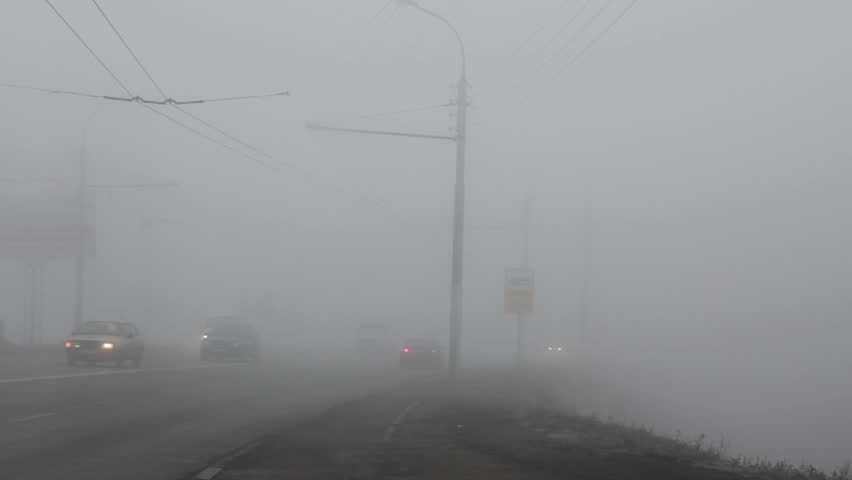 cars moving in the fog - timelapse