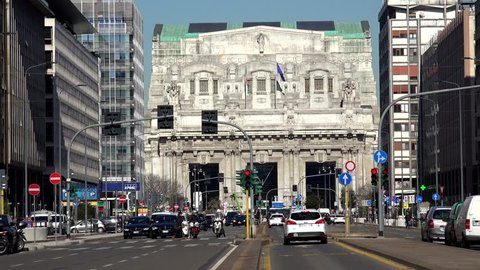 MILAN - ITALY, MARS 4, 2015 , ULTRA HD 4K Timelapse of traffic street and train station building by day
