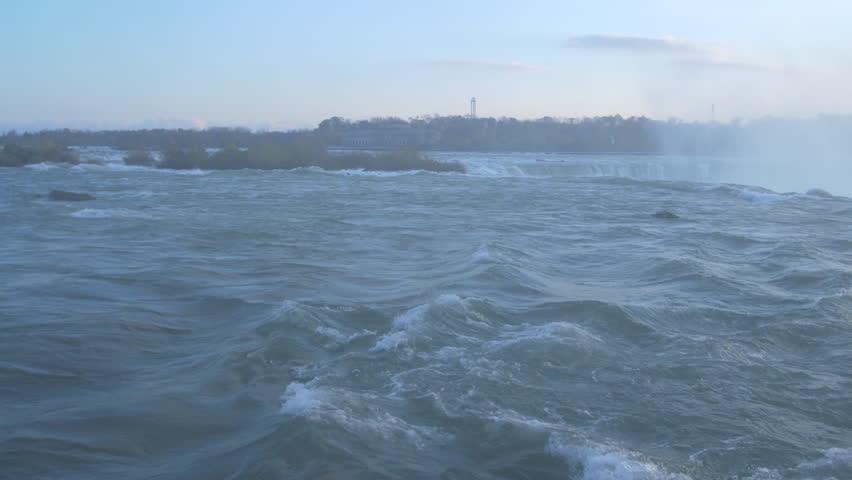 Water flowing at Niagara Falls at sunset, Ontario, Canada