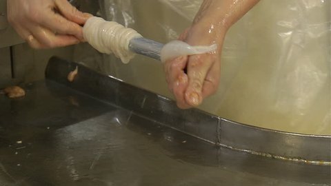 making sausage in a factory 