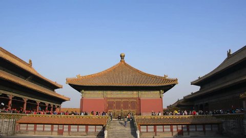 Beijing, China - October 17, 2014: Traditional Chinese building in The Palace Museum (Forbidden City). People are visiting. Located in Beijing, China.