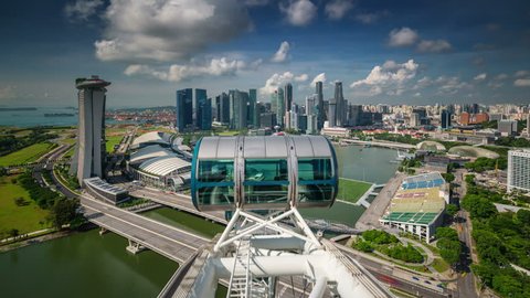 SINGAPORE, SINGAPORE - OCTOBER 2014: famous city flyer view on modern hotel and museum 4k time lapse circa october 2014 singapore, singapore.