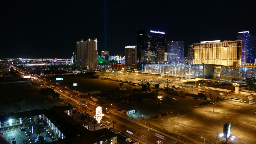 LAS VEGAS, NEVADA - March 22, 2015: Night cityscape time lapse of the Las Vegas strip towers in Southern Nevada.