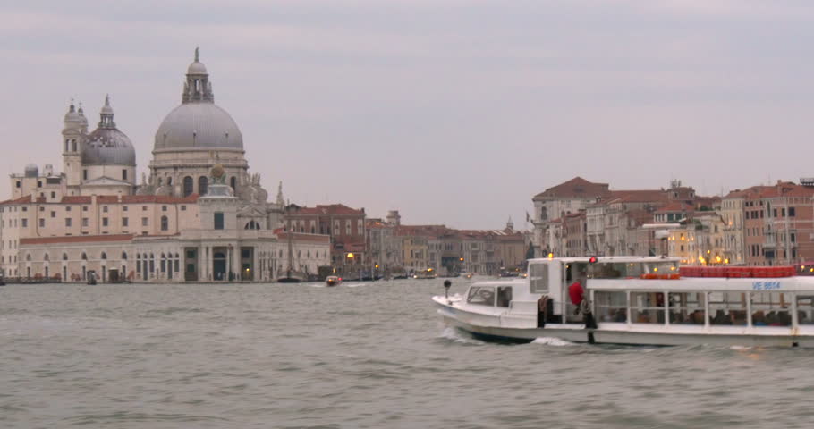 Venice landmarks and yachts view from vaporetto, Italy.
