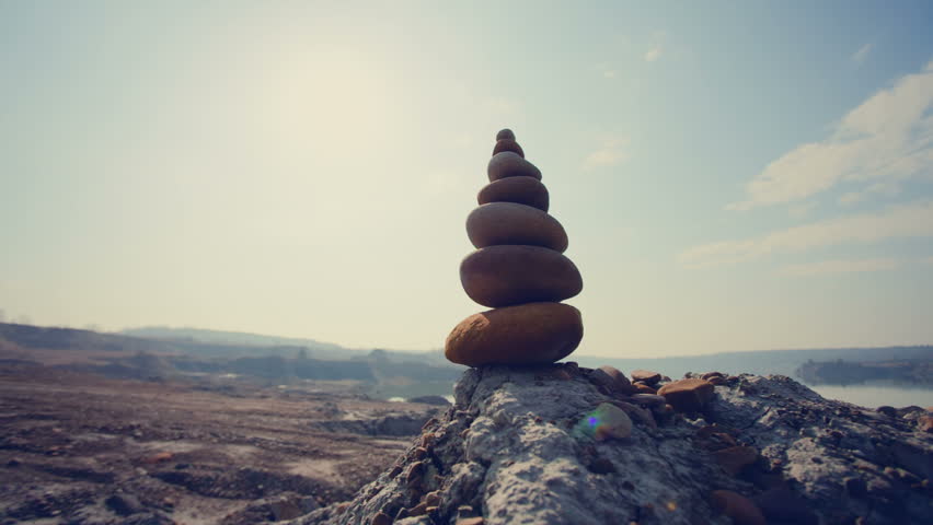 DOLLY MOTION: The Heap of stones against blue sky