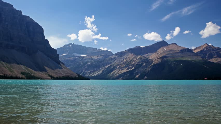 Time-lapse of clouds moving over the mountains above Bow Lake in Banff National Park, Alberta
