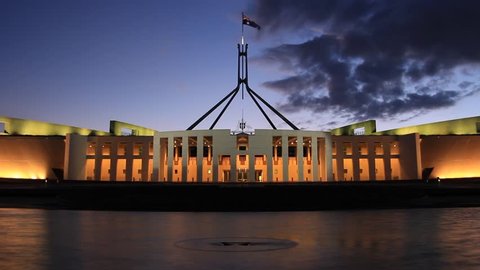 PARLIAMENT HOUSE, CANBERRA - FEBRUARY 2015: Night timelapse of Parliament House, the meeting facility of the Parliament of Australia located in Canberra, the capital of Australia.
