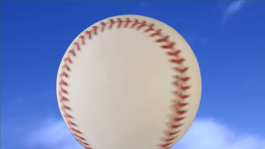 A baseball flies away from the camera