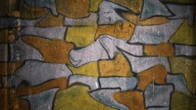 Video motion   graffiti brick,   masonry  curve uneven pattern ornament night light moves along the wall abstract background  pattern hd 1920x1080